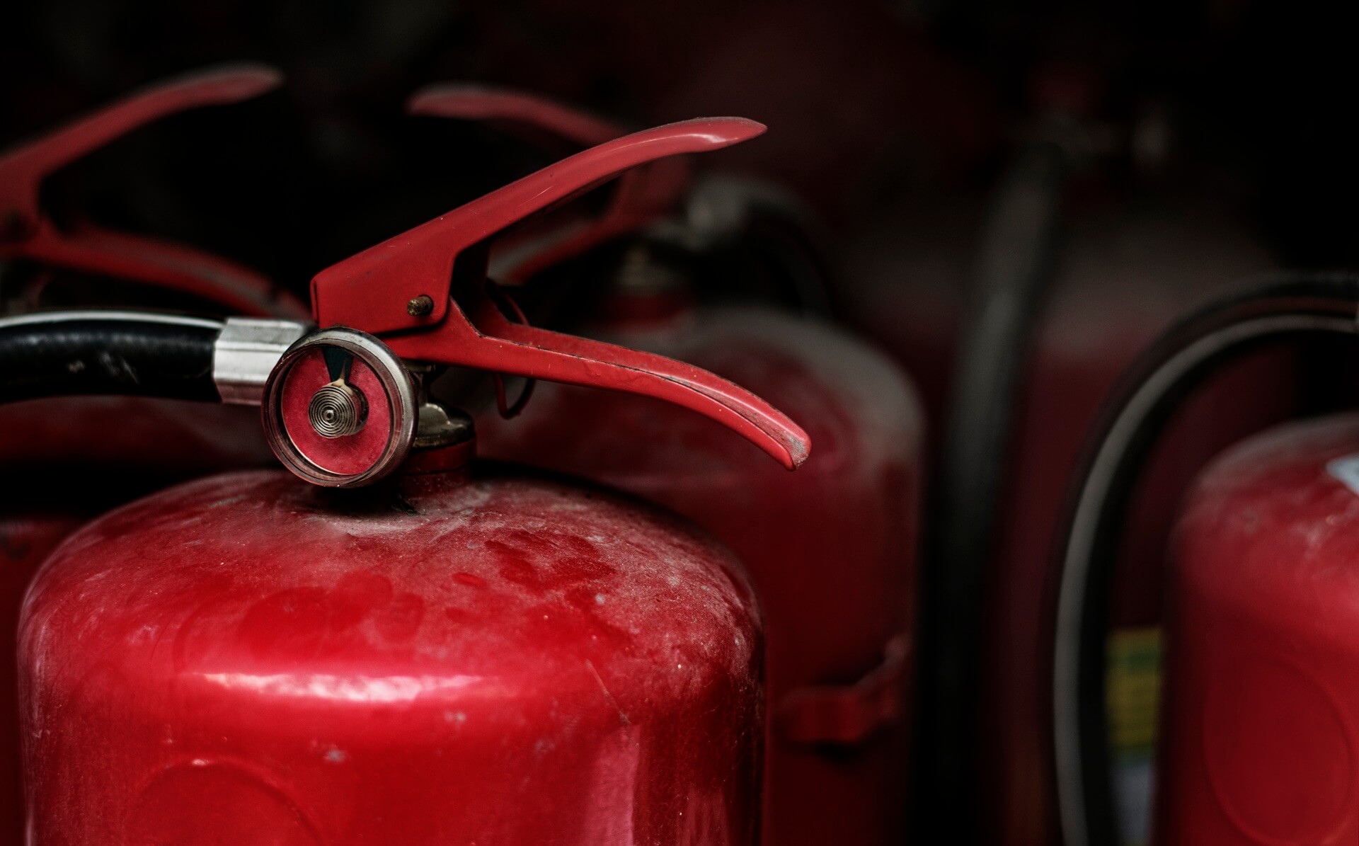 closeup-red-fire-extinguishers (1)